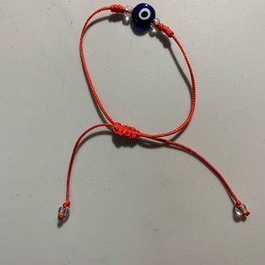 Protection eye bracelet, blue with red, hand made by me
